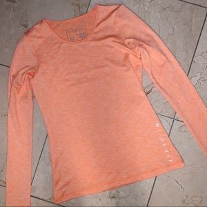 orange ripcurl shirt
